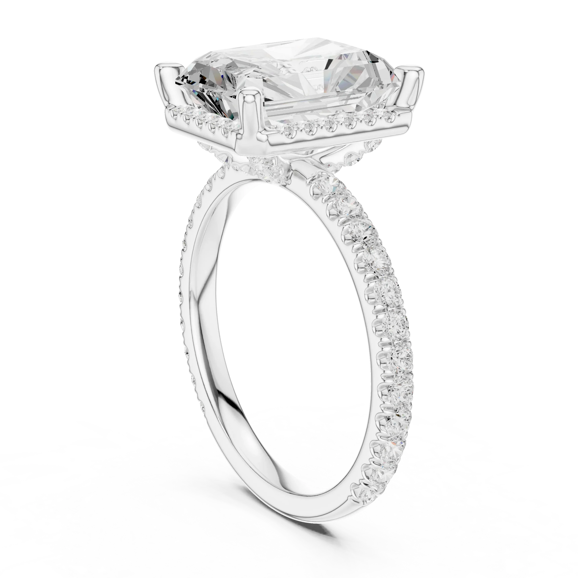 Back view of white gold radiant cut micro halo ring showing pav茅 diamond band and halo setting details