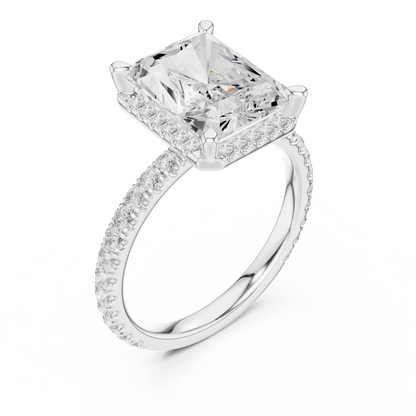 Front view of white gold radiant cut micro halo ring with pav茅 diamond band and lab-created diamond