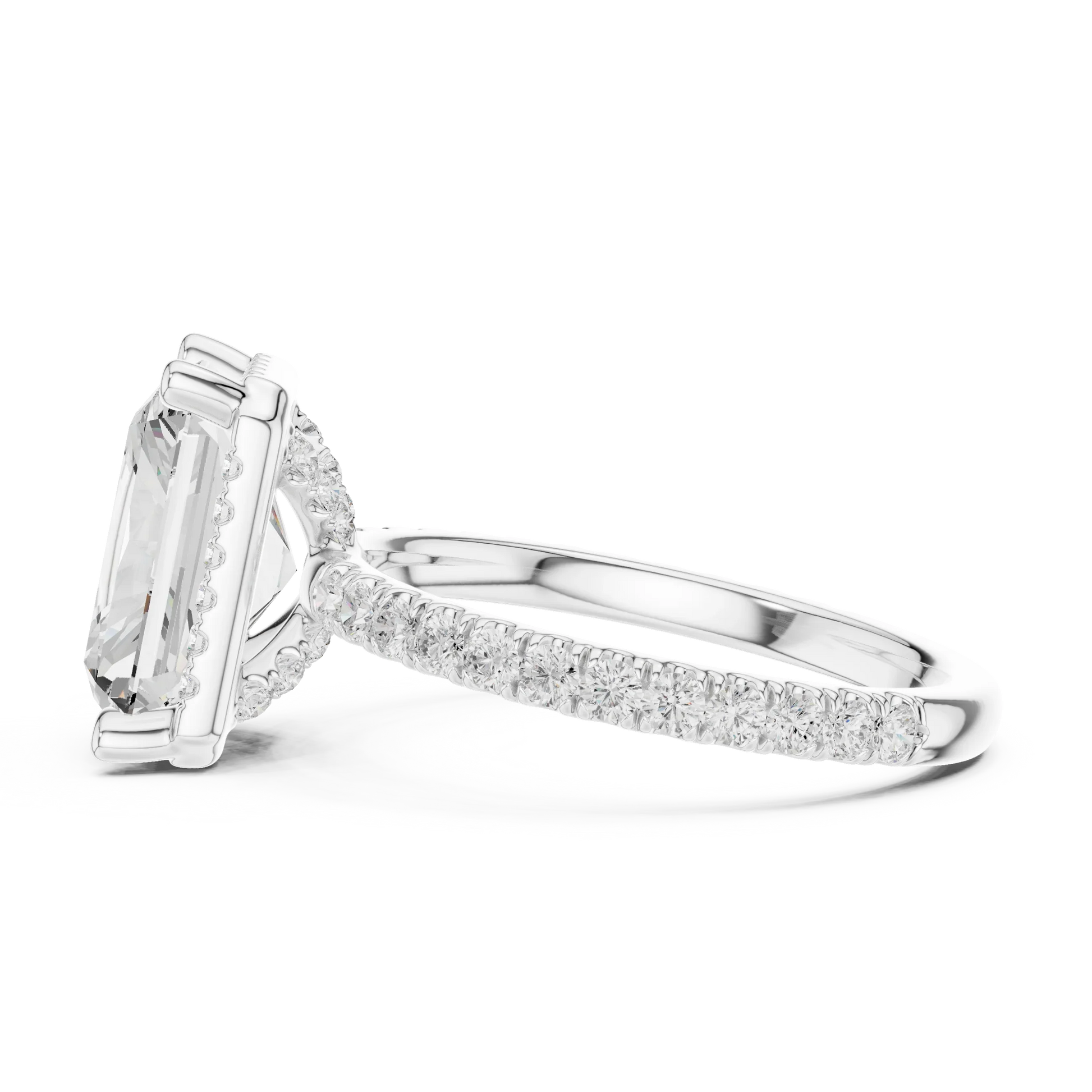 Side view of white gold radiant cut micro halo ring highlighting pav茅 diamond band and halo profile
