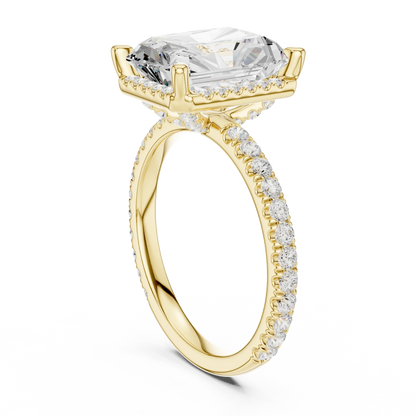 Back view of yellow gold radiant cut micro halo ring showing pav茅 diamond band and halo setting details