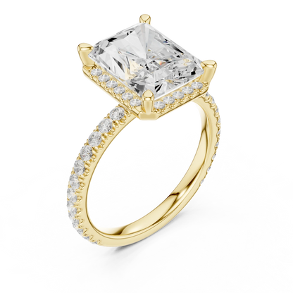 Front view of yellow gold radiant cut micro halo ring with pav茅 diamond band and lab-created diamond