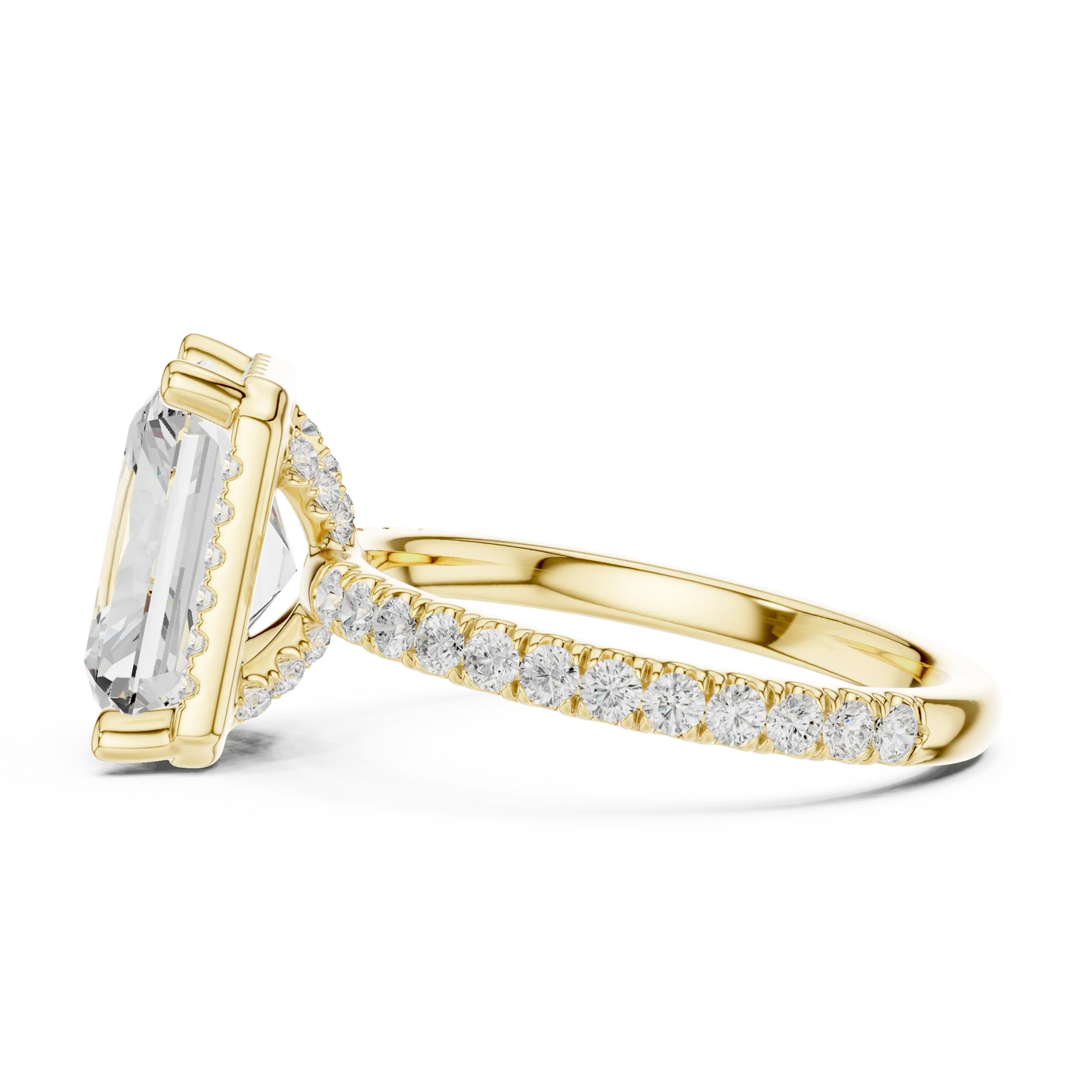 Side view of yellow gold radiant cut micro halo ring highlighting pav茅 diamond band and halo profile