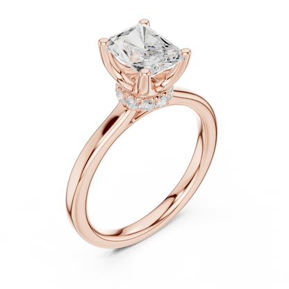 Front angled view of rose gold radiant cut solitaire ring with hidden halo and domed band showing both front details