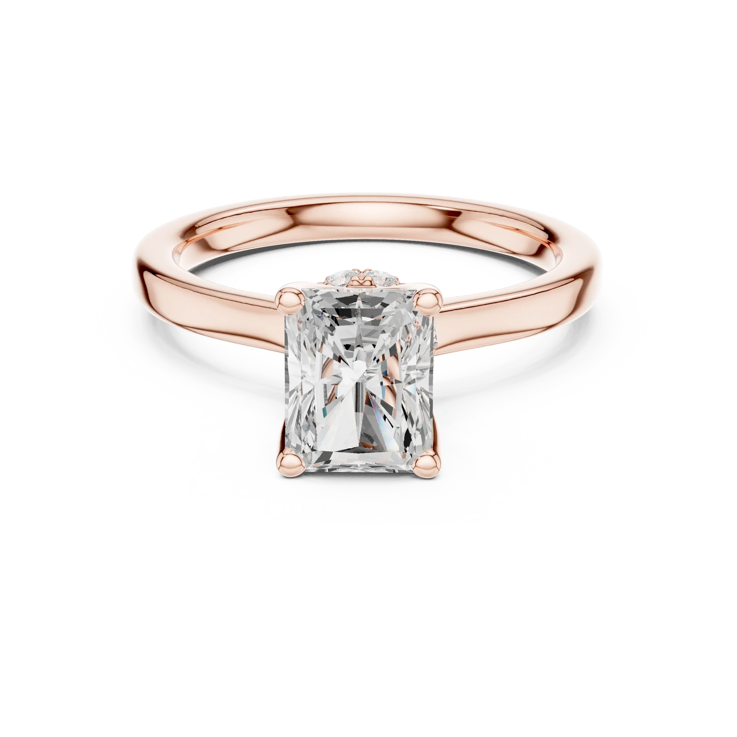 Rose gold radiant cut solitaire ring with hidden halo and domed band featuring lab-grown diamond, modern look