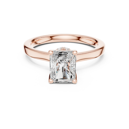 Rose gold radiant cut solitaire ring with hidden halo and domed band featuring lab-grown diamond, modern look