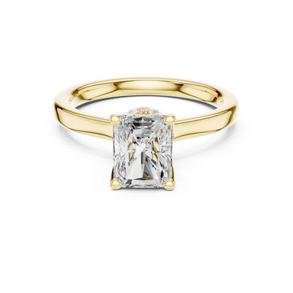 Yellow gold radiant cut solitaire ring with hidden halo and domed band featuring lab-grown diamond, classic style