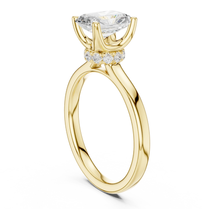 Back view of yellow gold radiant cut solitaire ring showing hidden halo and domed band details