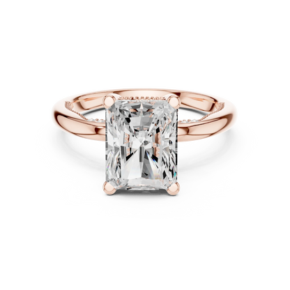Rose gold radiant cut solitaire ring with hidden halo and domed band featuring lab-grown diamond, modern look