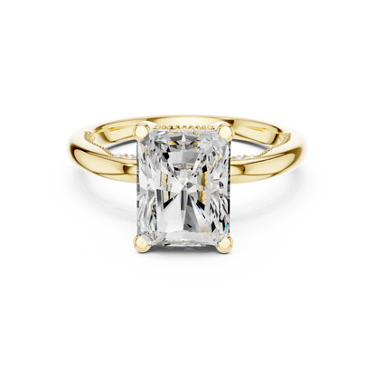 Yellow gold radiant cut solitaire ring with hidden halo and domed band featuring lab-grown diamond, classic style