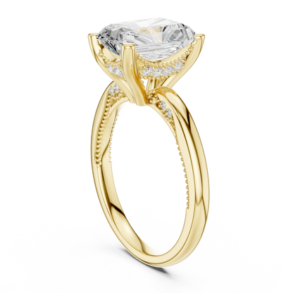 Back side view of yellow gold radiant cut solitaire ring showing hidden halo and domed band details