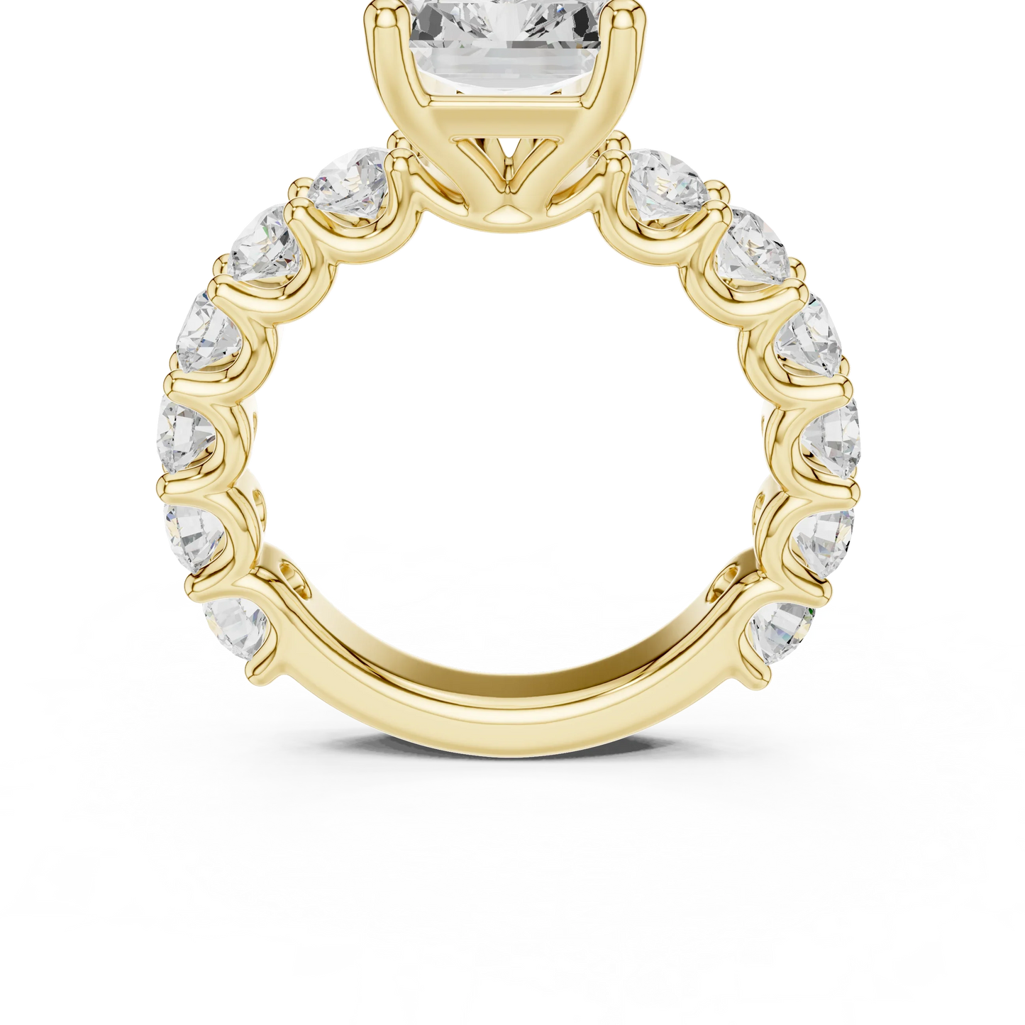 Front view of yellow gold radiant cut solitaire ring with shared prong large stone band and center gemstone