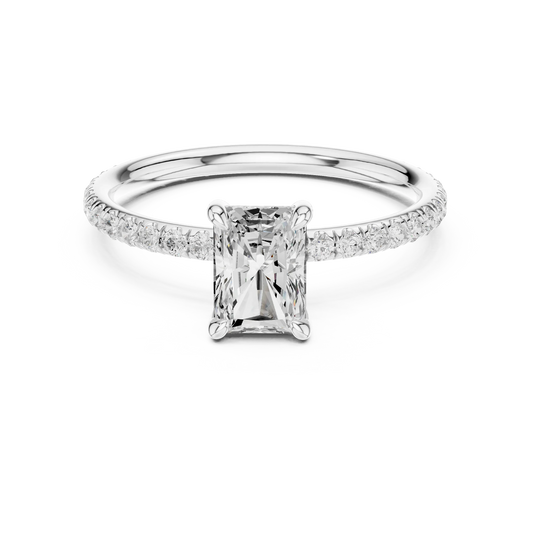 Lab-grown radiant cut solitaire ring in white gold with thin pavé diamond band