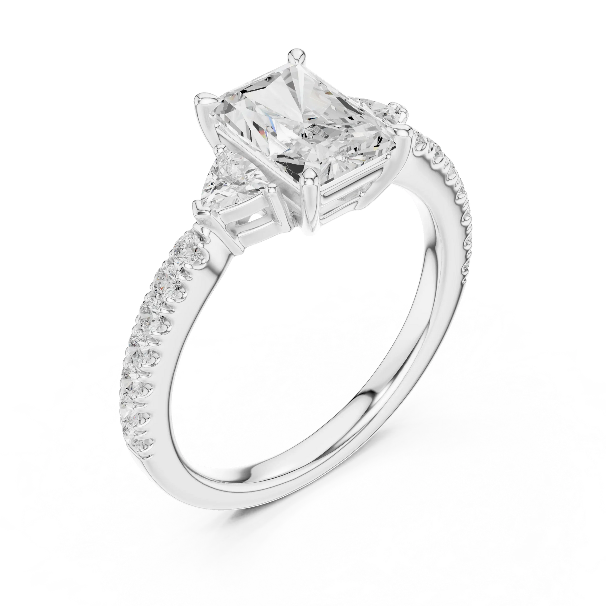 Front view of white gold radiant three stone diamond ring with half moon side stones and pave band, showcasing center stone.