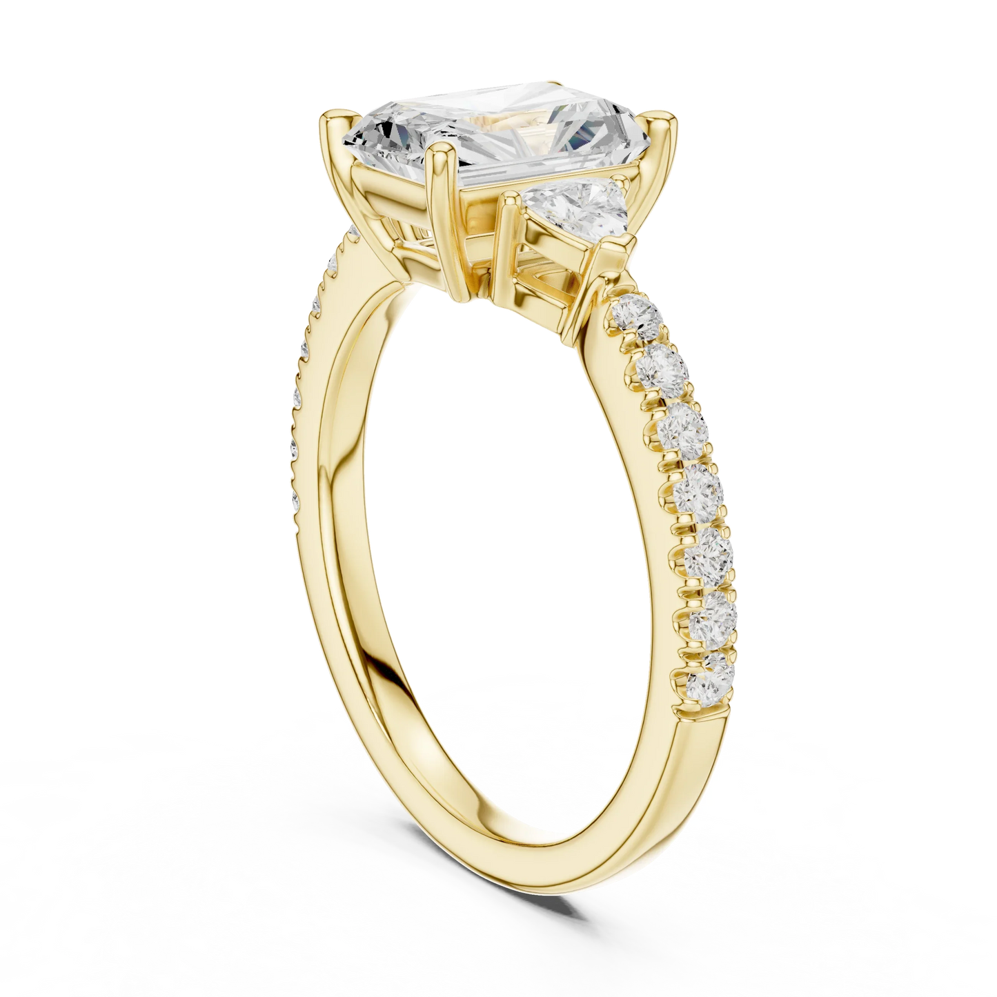 Back view of yellow gold radiant three stone diamond ring with half moon side stones and pave band, showing band structure