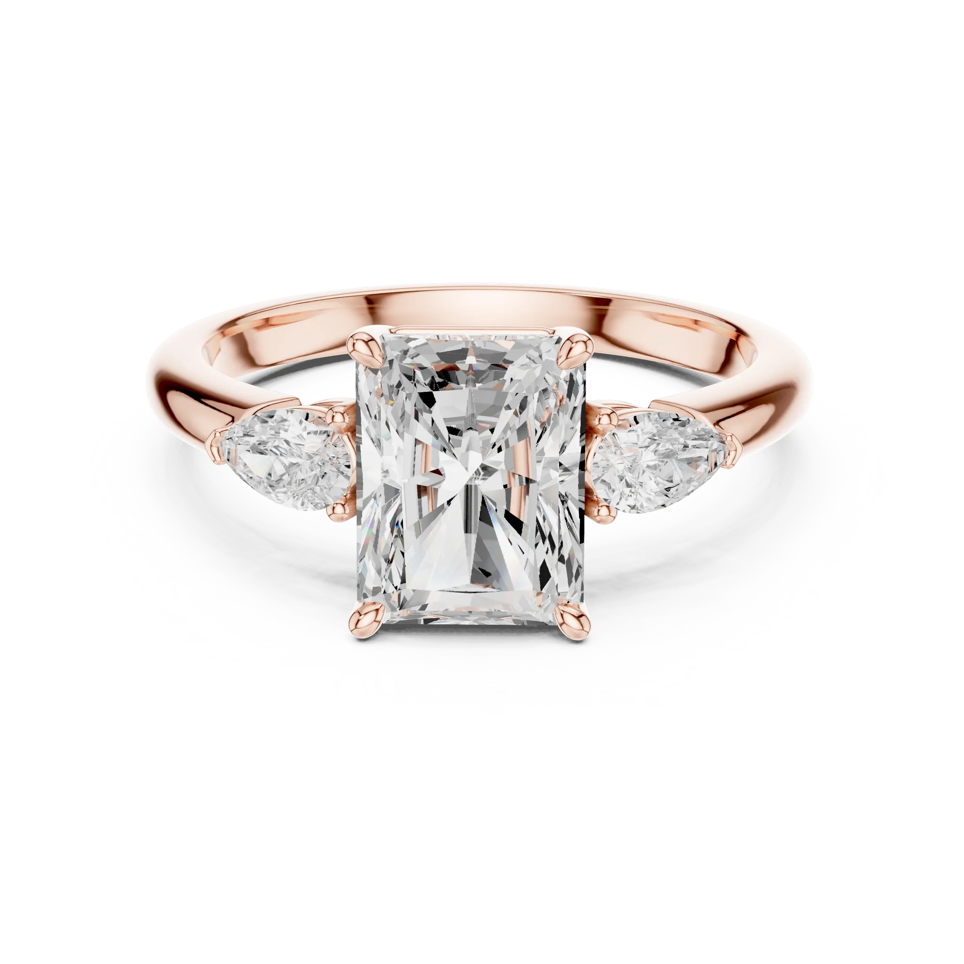 Radiant three-stone ring in rose gold with pear side stones and lab-grown diamond 鈥?Australia