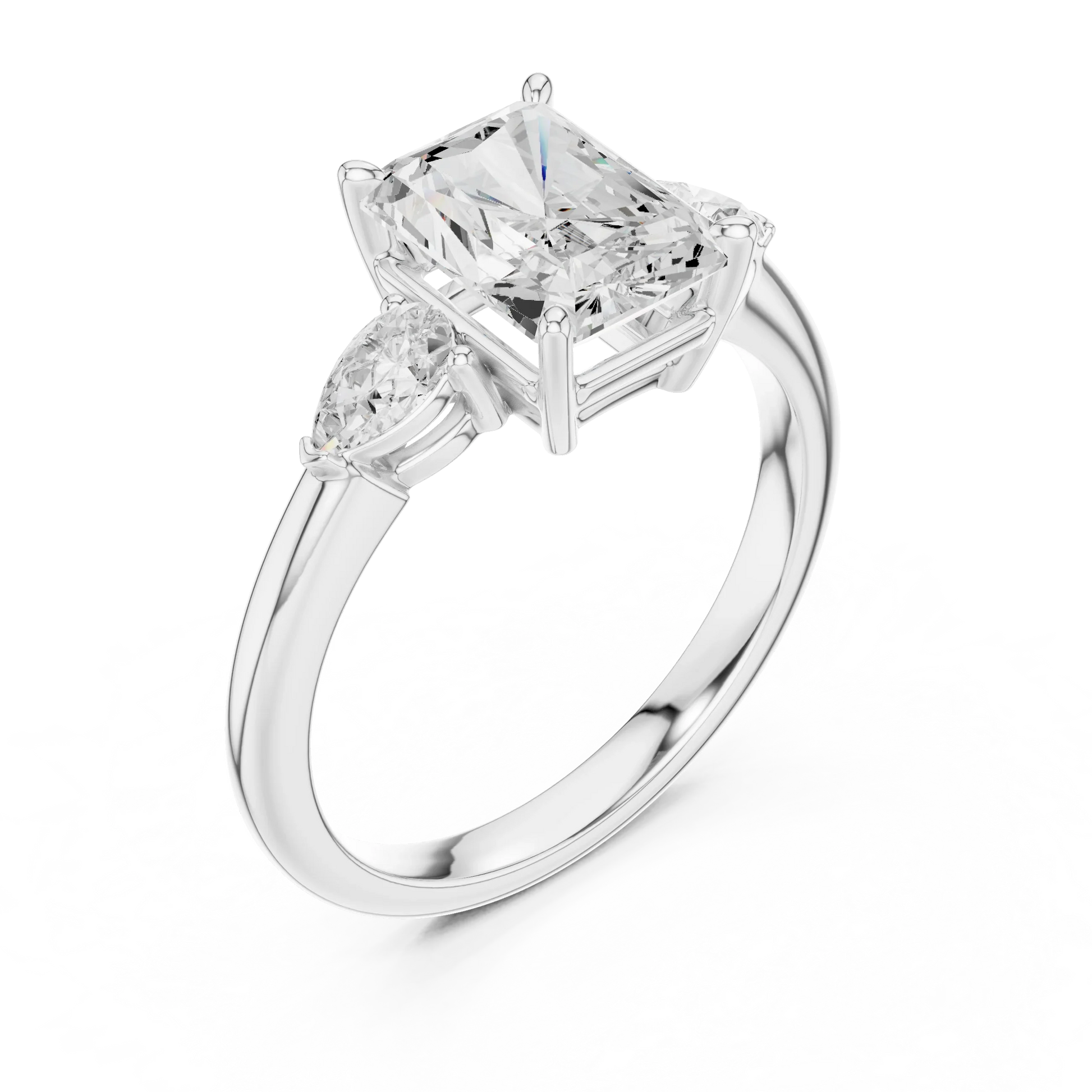 Front view of white gold radiant three-stone ring with pear side stones and lab-grown diamond 鈥?Australia
