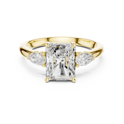 Radiant three-stone ring in yellow gold with pear side stones and lab-grown diamond 鈥?Australia