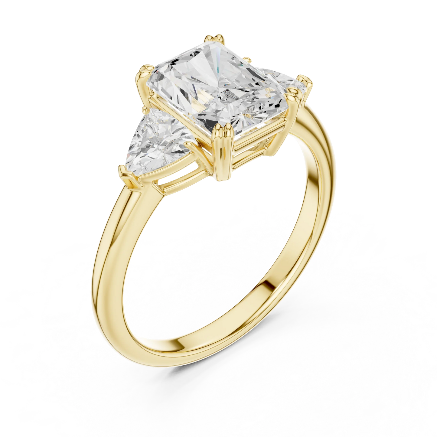 Front view of yellow gold radiant three-stone ring with trillion cut side stones and lab-grown diamond 鈥?Australia