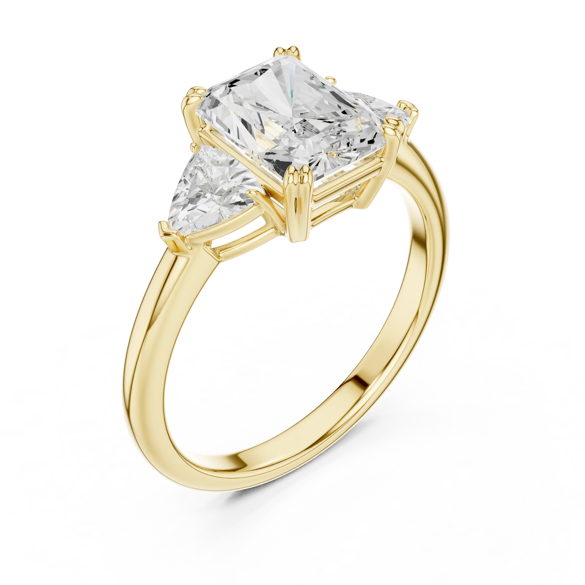 Front view of yellow gold radiant three-stone ring with trillion cut side stones and lab-grown diamond 鈥?Australia