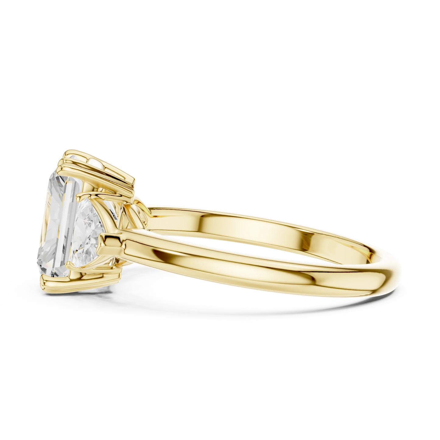 Side view of yellow gold radiant three-stone ring with trillion cut side stones and lab-grown diamond 鈥?Australia