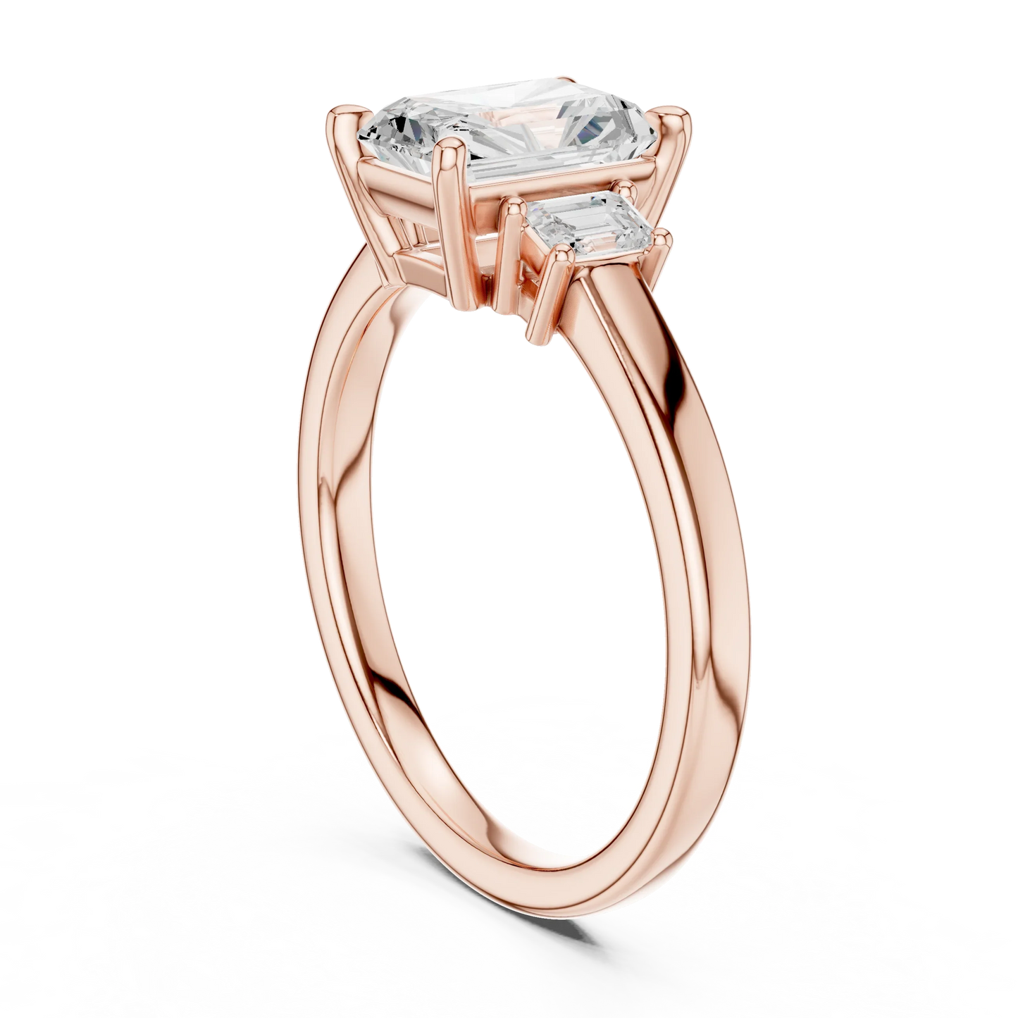 Radiant three stone engagement ring with emerald cut side stones in rose gold, lab grown diamond, back view, Australia DFE