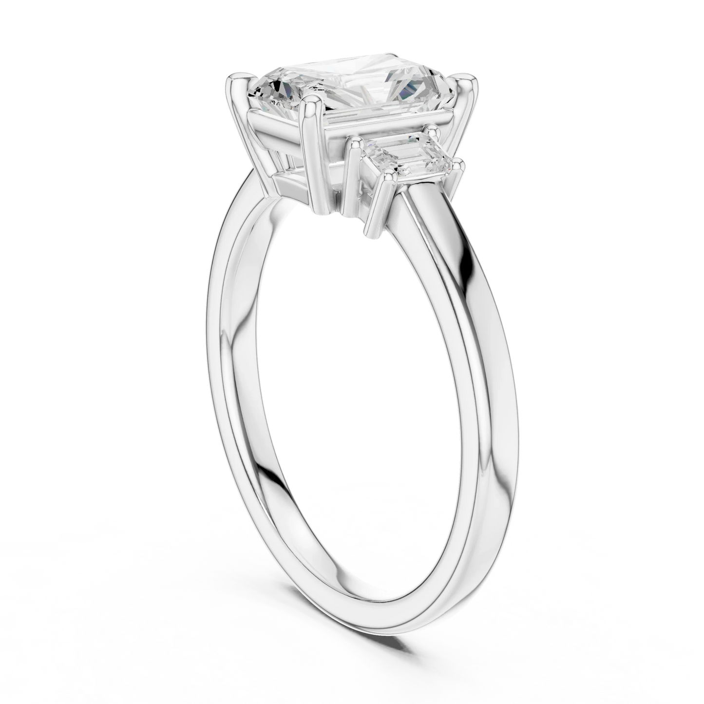 Radiant three stone engagement ring with emerald cut side stones in white gold, lab grown diamond, back view, Australia DFE