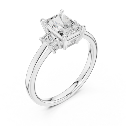 Radiant three stone engagement ring with emerald cut side stones in white gold, lab grown diamond, front view, Australia DFE