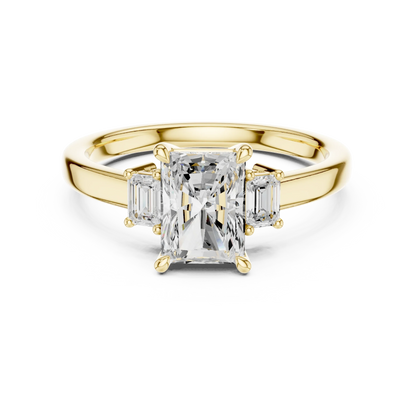 Radiant three stone engagement ring with emerald cut side stones in yellow gold, lab grown diamond, Australia DFE