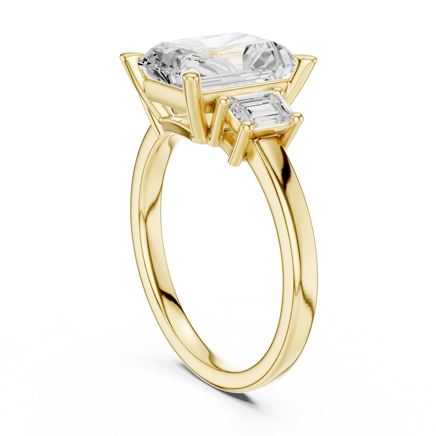 Back view of yellow gold radiant three stone ring featuring step cut trapezoid side stones and smooth band
