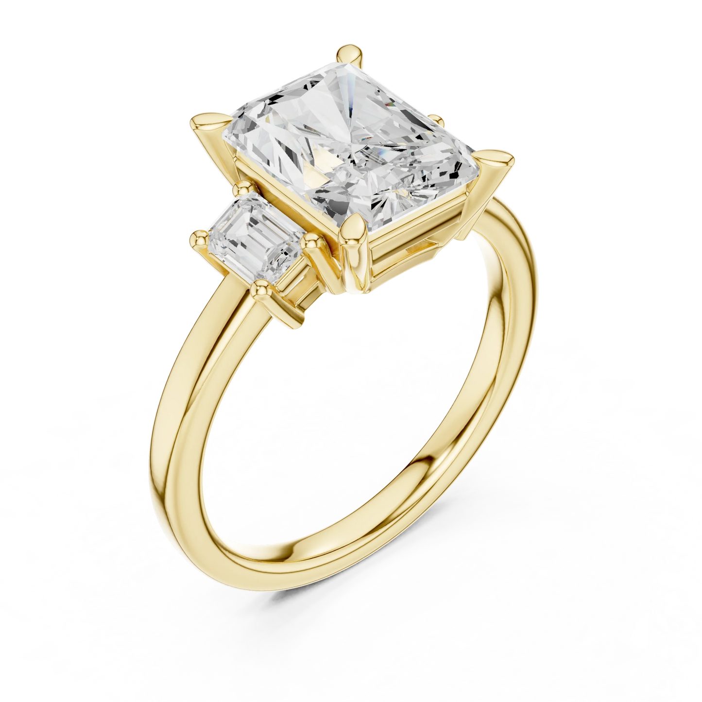 Front view of yellow gold radiant three stone ring with step cut trapezoid side stones and lab-grown diamonds