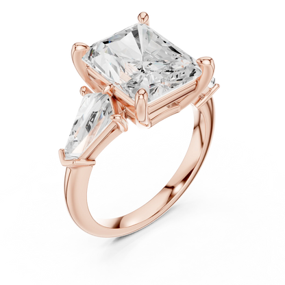 Front view of rose gold radiant three stone ring with trillion side stones and lab-grown diamonds