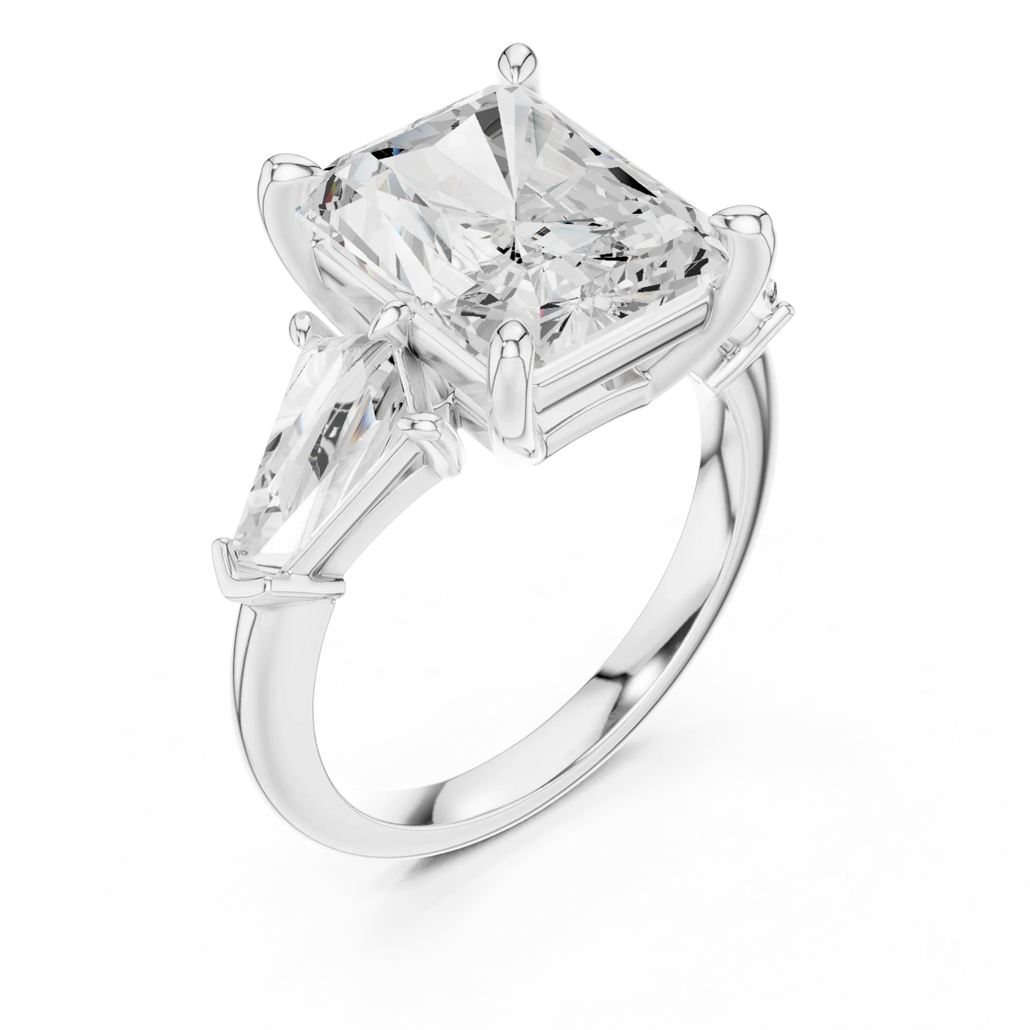Front view of white gold radiant three stone ring with trillion side stones and lab-grown diamonds