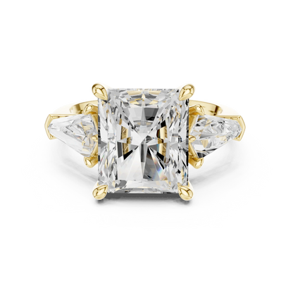 Radiant three stone ring with trillion side stones and lab-grown diamonds in yellow gold with classic luxury appeal