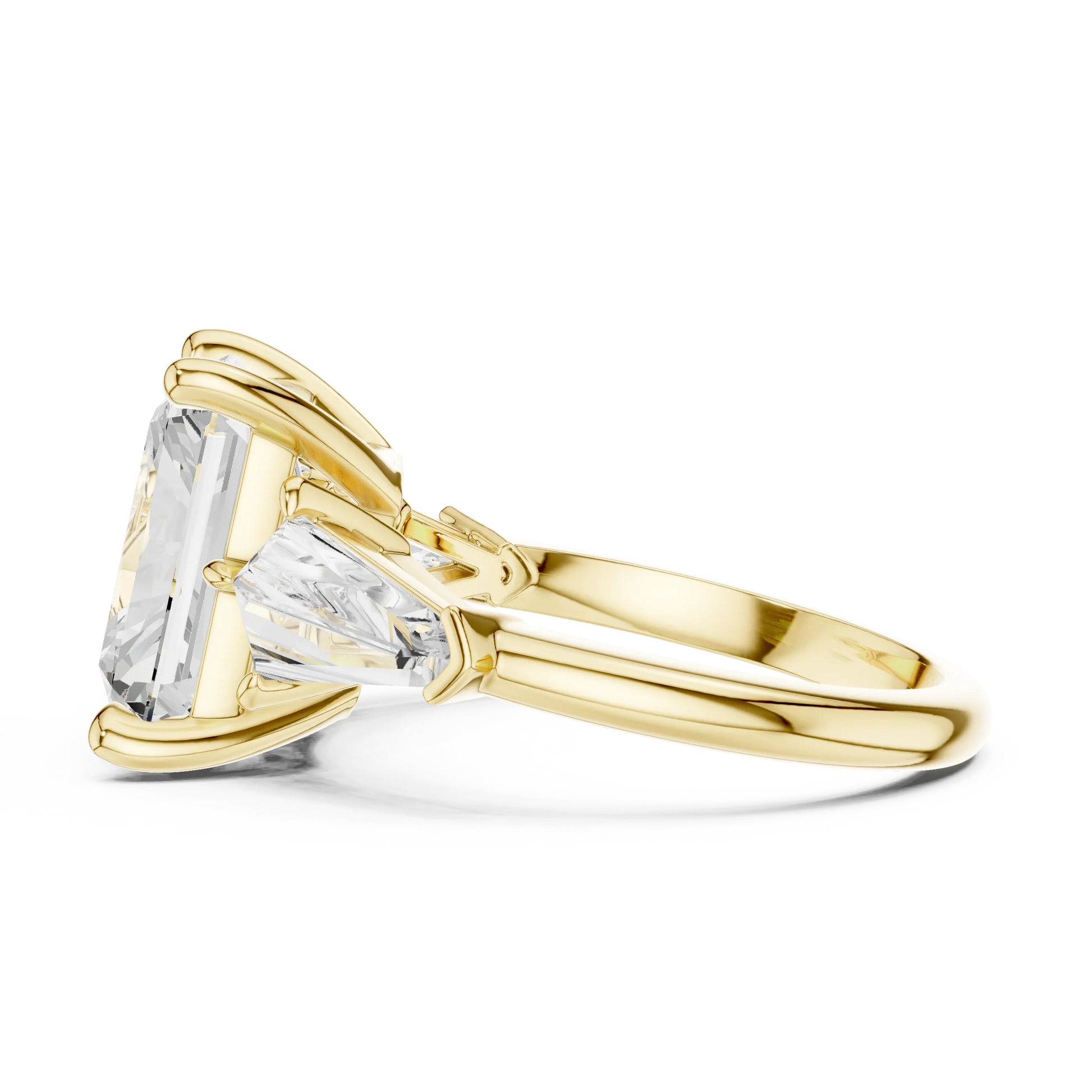 Side profile of yellow gold radiant three stone ring highlighting trillion side stones and structure
