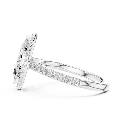 Side view of white gold marquise cut diamond ring with regal halo setting showing elevated center stone and refined band profile