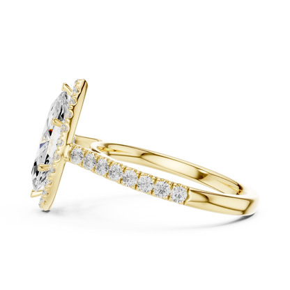Side view of yellow gold marquise cut diamond ring with halo setting highlighting band structure and center stone elevation