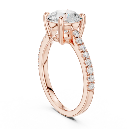 Back side view of rose gold round diamond pavé band ring showing band and setting details