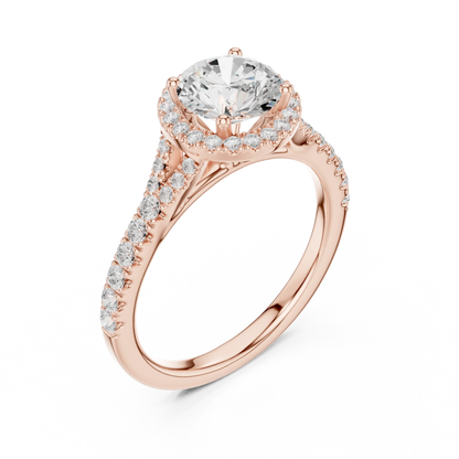 Front view of rose gold round halo ring with pav茅 split shank band and center diamond