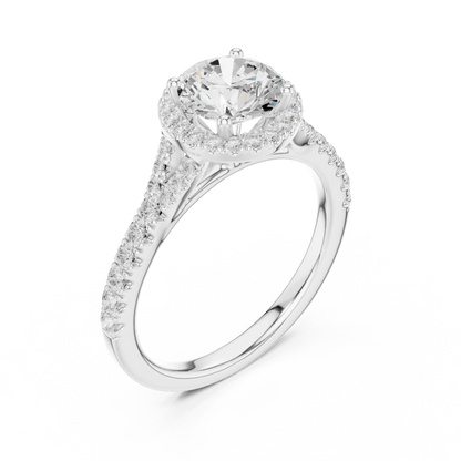 Front view of white gold round halo ring with pav茅 split shank band and center diamond