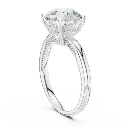 Back view of white gold round cut solitaire ring showing hidden halo and domed band details