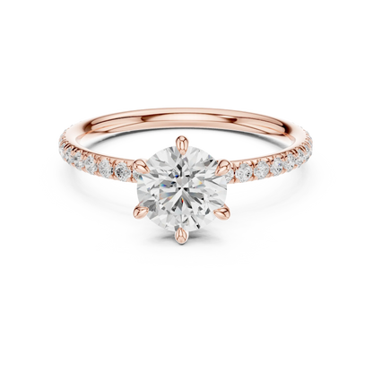 Lab-grown round cut solitaire ring in rose gold with thin pavé diamond band