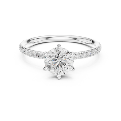 Lab-grown round cut solitaire ring in white gold with thin pavé diamond band