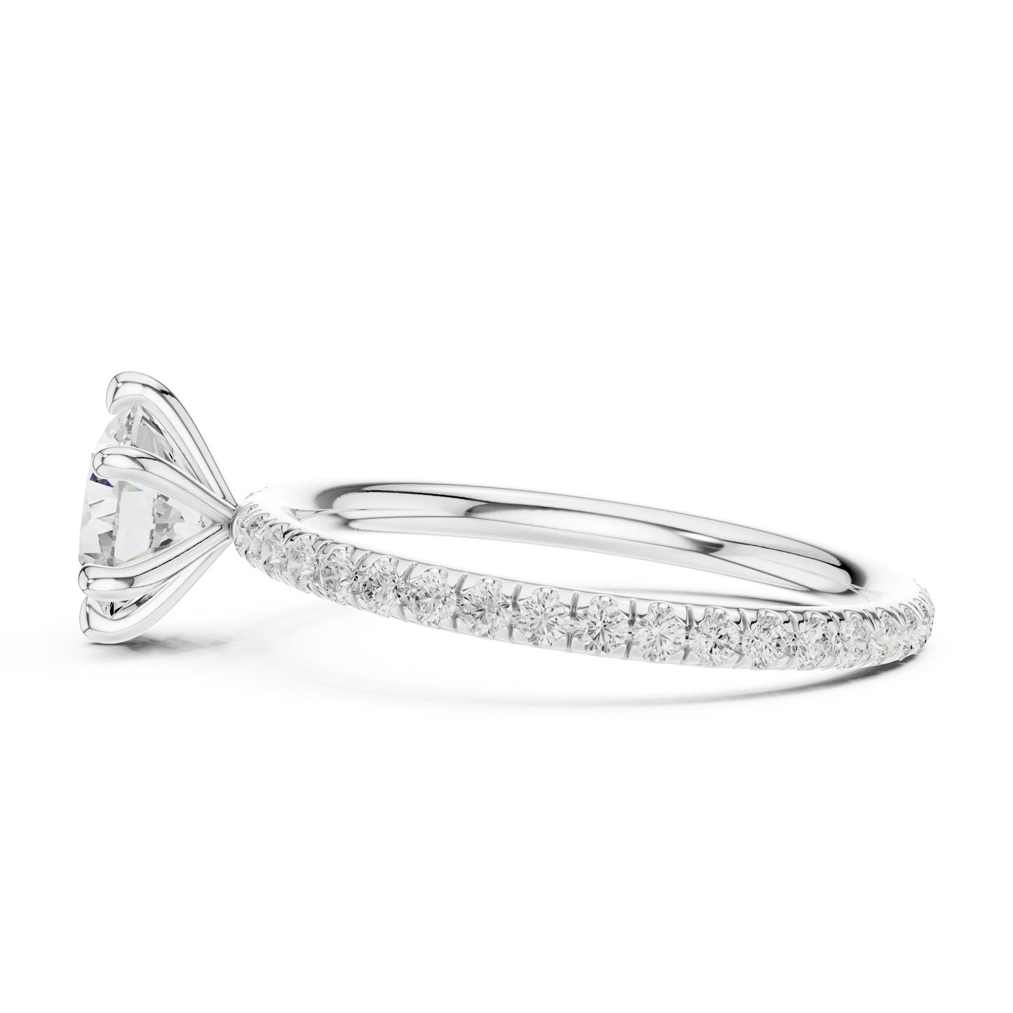 Side view of white gold round cut solitaire ring with thin pavé diamond band and raised setting