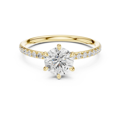 Lab-grown round cut solitaire ring in yellow gold with thin pavé diamond band