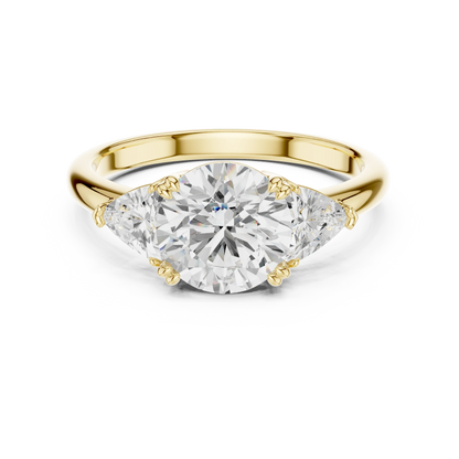 Round three-stone ring in yellow gold with trillion cut side stones and lab-grown diamond 鈥?Australia