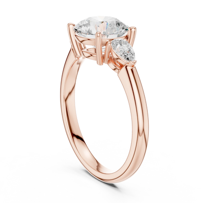 Back side view of rose gold round three-stone ring with pear side stones and lab-grown diamond 鈥?Australia