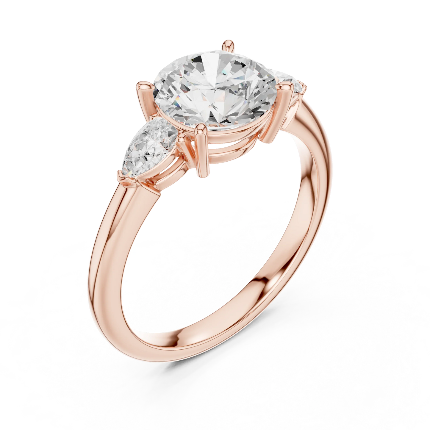 Front view of rose gold round three-stone ring with pear side stones and lab-grown diamond 鈥?Australia