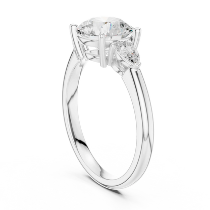 Back side view of white gold round three-stone ring with pear side stones and lab-grown diamond 鈥?Australia
