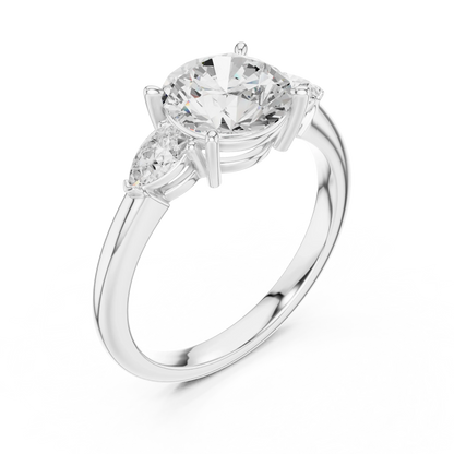 Front view of white gold round three-stone ring with pear side stones and lab-grown diamond 鈥?Australia