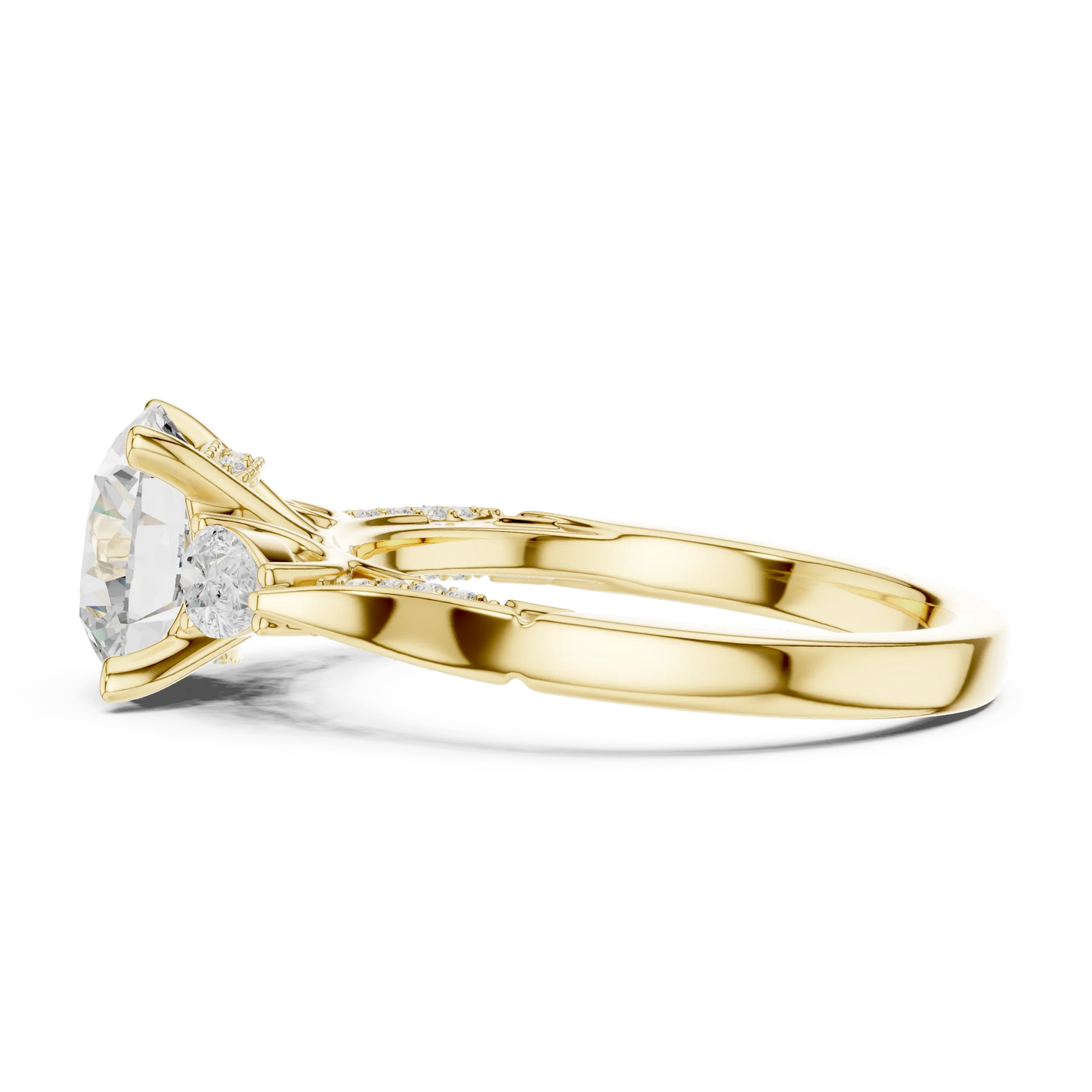 Side view of yellow gold round three stone ring with pear side stones, pave accents and lab-grown diamonds – Australia